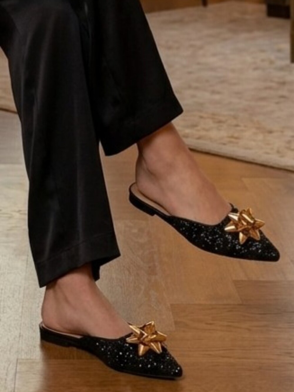 ANTONIO MELANI Black Pointed Slip-On Mule with Gold Bow